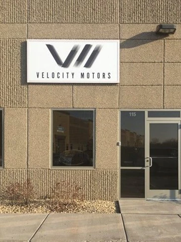 Building Sign for Velocity Motors in Apple Valley, MN, Cast Vinyl Sign