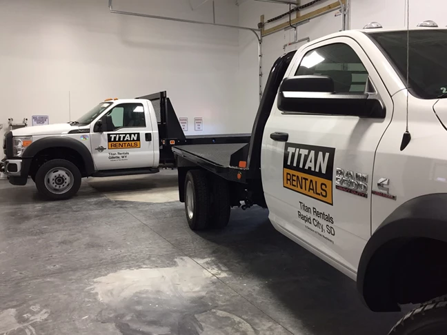 Titan Rental trucks going to SD and WY. Graphics installed here at our shop. 