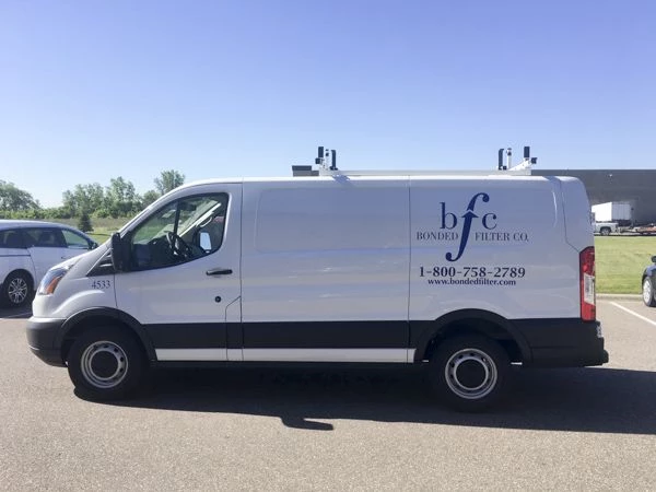 Vehicle graphics, vehicle wraps, Company Logo on van, Bonded Filter